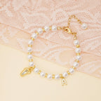 Baby Keepsake Pearl Bracelet with Name Foot and Initial Charm - Glaxias