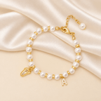 Baby Keepsake Pearl Bracelet with Name Foot and Initial Charm - Glaxias